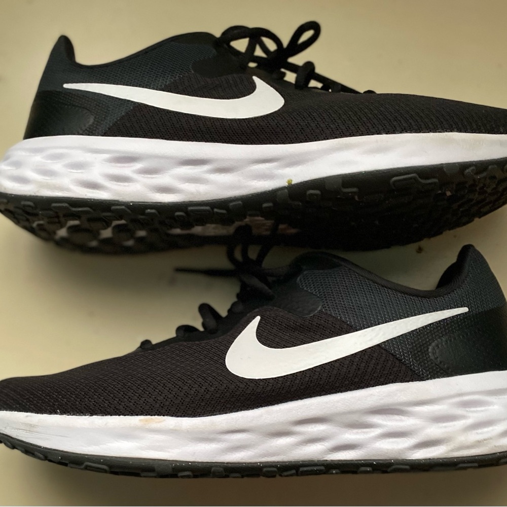 Woman’s Nike Black and White Athletic Shoes size 11.5